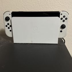 Nintendo Switch OLED  With Joystick And Grand Theft Auto 