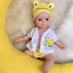 (212121-43) Lifelike Full Body Silicone Reborn Baby Dolls Girl - 11Inch Realistic Full Silicone Body Baby Doll with Big Eyes Yellow Frog Set for 3+ Ye