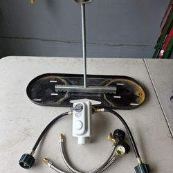 RV duel 20 pound propane tank holder with dual stage regulator and insulated cover. 