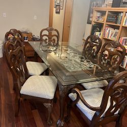 Glass Top Table With 6 Chairs72” W x 42” d X 30”h. 