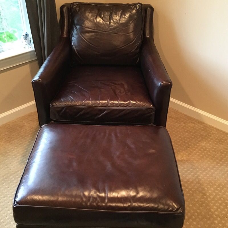 Pottery Barn leather arm chair + ottoman made by Mitchell Gold+Bob Williams