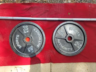 OLYMPIC 7' BAR.   90LBs 
2-45s.
IN GOOD CONDITION  
11525 S HALSTED  DUNKIN DONUTS/
7111.S WESTERN WALGREENS 
140$.   CASH ONLY AS IS