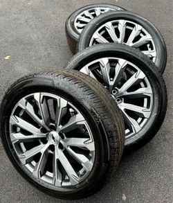 New 22” inch OEM GM wheels silverado 1500 tahoe Suburban sierra 1500 yukon escalade wheels rims Bridgestone 275/50/22 tires hablo español