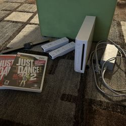 Wii Console with 2 Controllers + Extras
