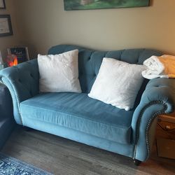 Beautiful teal couch and love seat