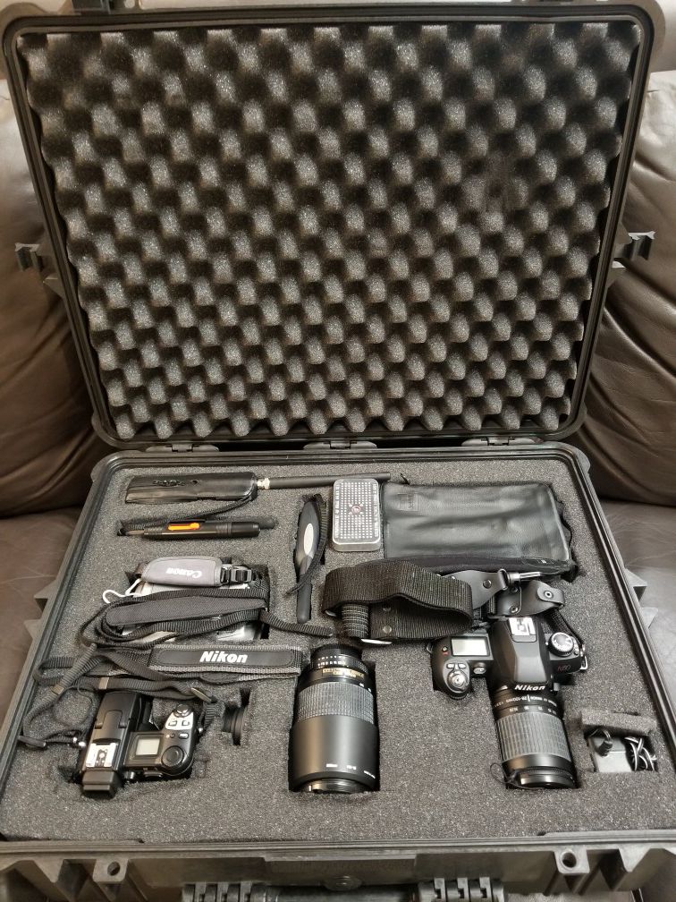 BRAND NEW LARGE CASE W/CAMERA EQUIPMENT AND ALL EXTRA (INDIVIDUAL CASES, EXTRA BATTERIES, EXTRA LENSES, AND MUCH MORE)