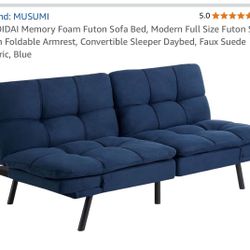 Futon In Very Good Condition.  Color Blue