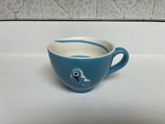 Starbucks 2006 Blue Ceramic Mug with Playful Ghost