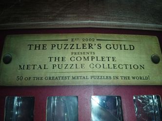 50 piece metal brain teaser puzzles $35
