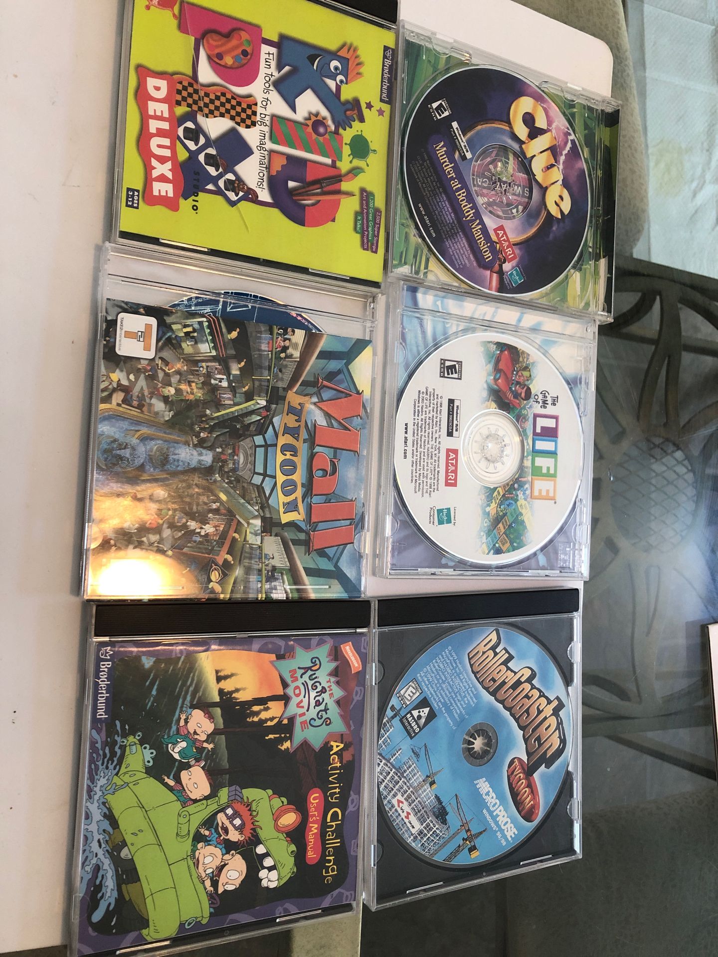 6 computer games and designs. Design and crest your own mall and roller coaster plus other computer games