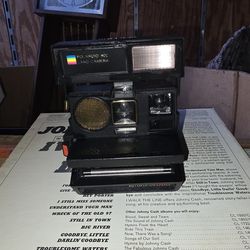 Polaroid 600 Sun660 Autofocus instant film camera.