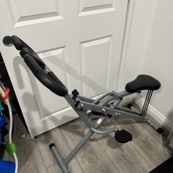 Row-and-Ride Squat Assist Trainer Machine