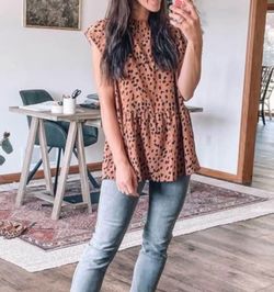 Women’s babydoll style cap sleeve shirt