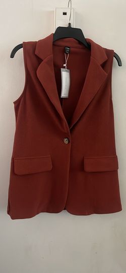 New sleeveless blazer
