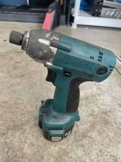 Makita Impact And Charger . Works Great ! Super Light Quality Tool