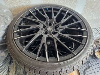 22 inch Lexani wheel/rims with tires.