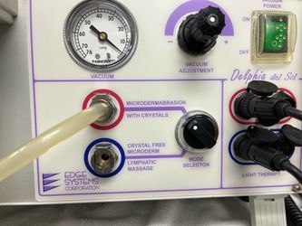Microderm abrasion machine with red and blue light. Edge Systems Microderm abrasion machine with red and blue light.