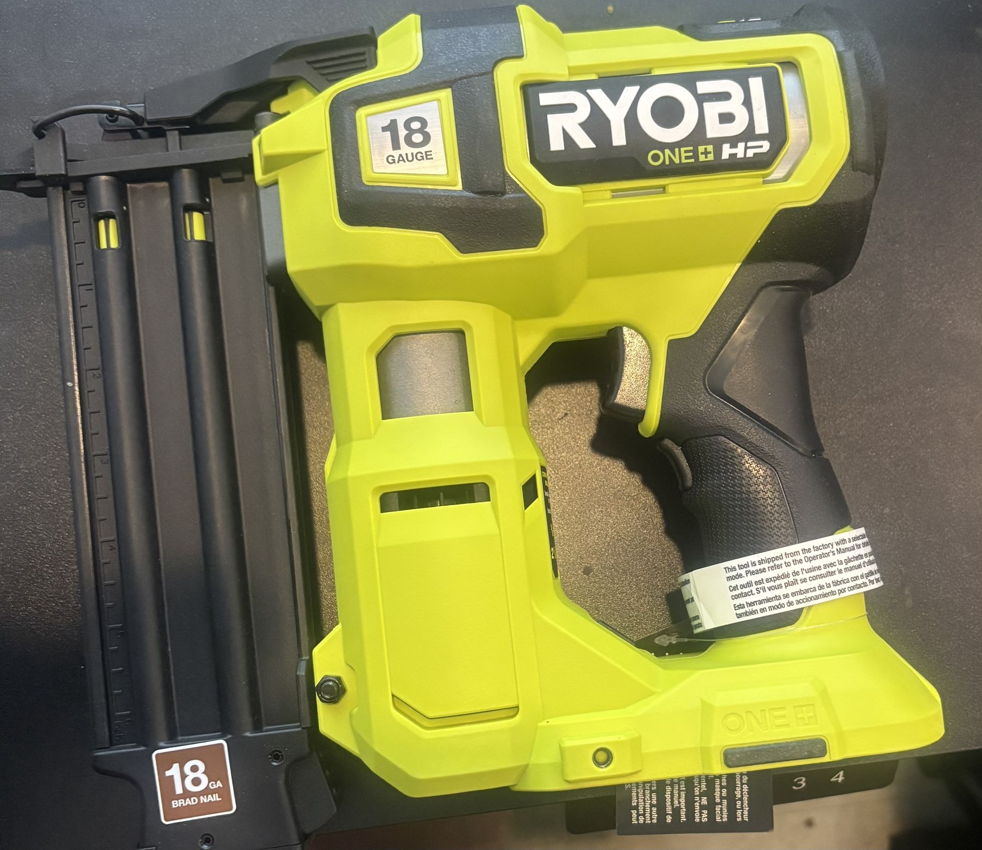 Ryobi P322 ONE + HP 18V 18- Gauge Brushless Cordless Air strike Brad Nailer (Tool Only)