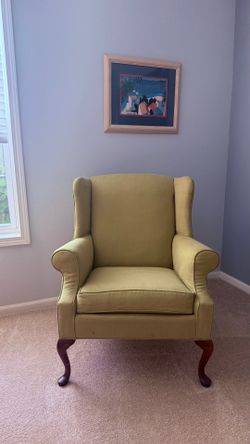 Green wingback chair
