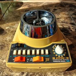 Vintage Hamilton Beach Westbend blender 631

This vintage Hamilton Beach Westbend blender is a classic electric blender with a gold color and a power 