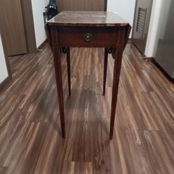 Antique.
Folding table