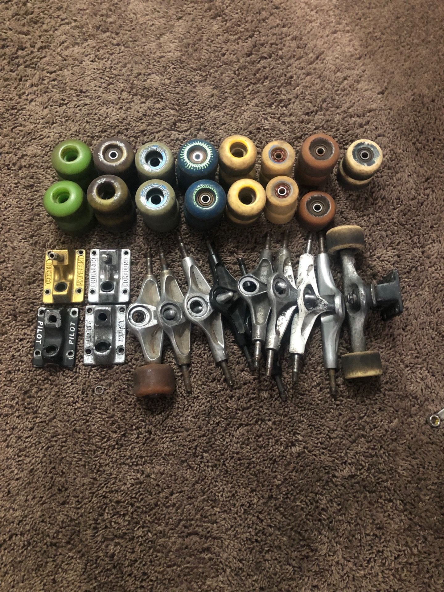 Skateboard wheels and trucks