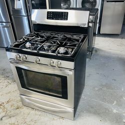 Kenmore stainless steel stove, 30 inches wide, with a receipt for a 60-day warranty.