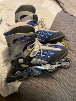 Blue and Silver Inline Rollerblades