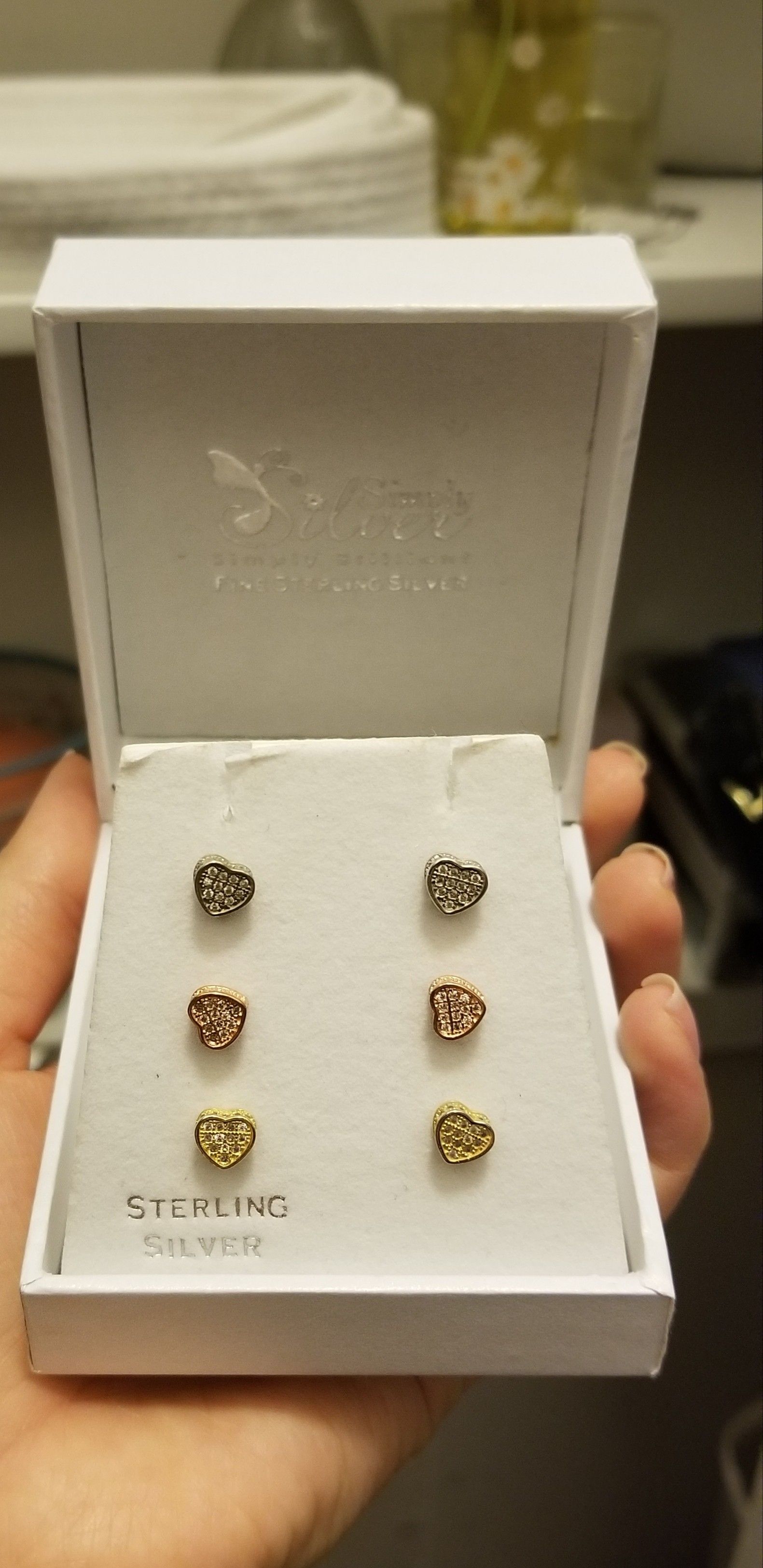 Sterling silver heart earrings.