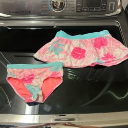 Girl, swimsuit, bottoms, and skirt size 4