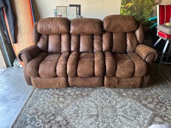 Recliner couch ( 7’). Wallhugger “)