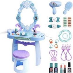 New in the box. Toddler size vanity set with mirror, lights and sound. Measurements in picture.