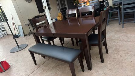 Dining table and 4 chairs on bench