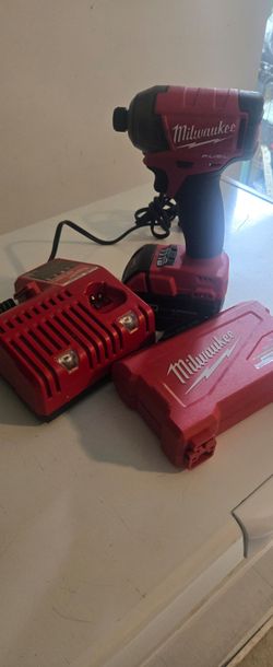 Milwaukee power drill, Exellent Condition FUEL MODEL IMPACT TYPE
ONE battery and the battery charger included 
Pick up in Sun Valley