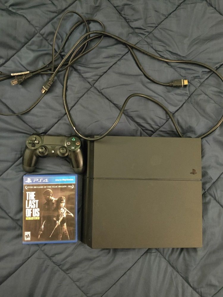 500gb PS4 with The last of Us game.