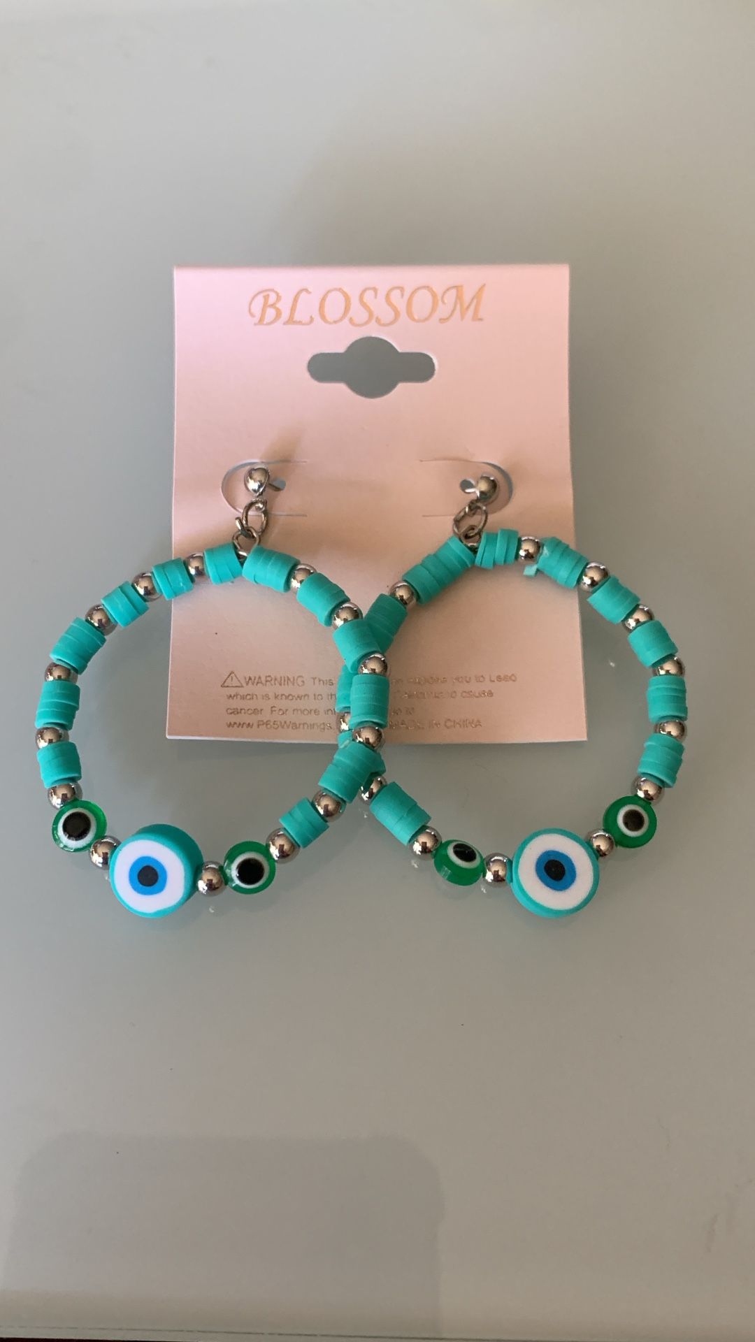 Turquoise evil eye hoop earrings