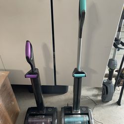 Two Rechargeable Bissell Vacuum Cleaners 