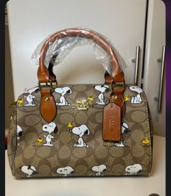 Coach x peanuts snoopy barrel bag