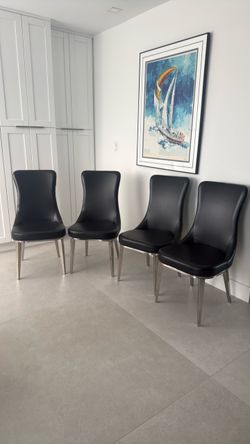 4 dining chairs black leather and silver legs , sillas de comedor de cuero negro y patas de metal