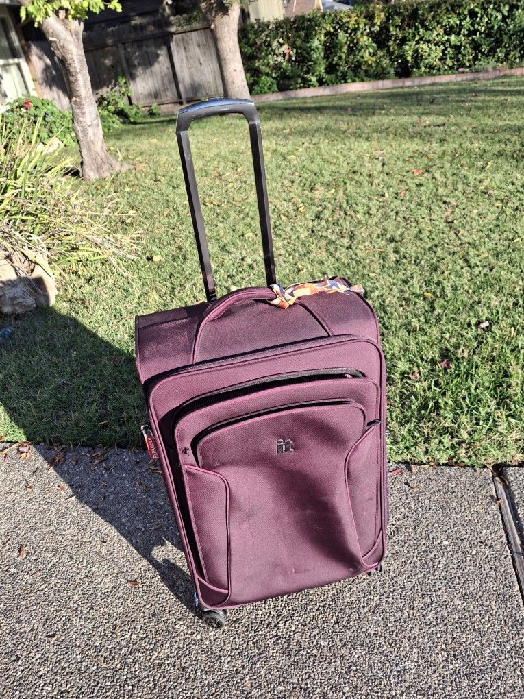 Two Rolling Suitcases 