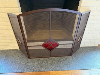 Fireplace screen w/stained glass panels in great condition Glass 32.5h x 30w in center Ends 12w Smoke free household
