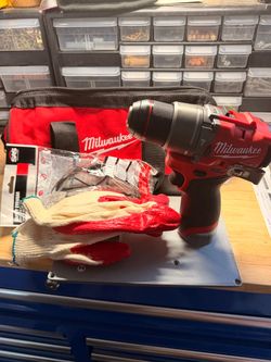 Milwaukee Fuel Hammer drill + extras