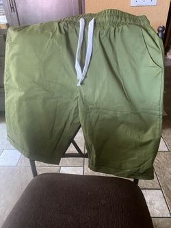 Brand New Three Pair Shorts, Darker, Green, Dark Navy And Black. They Say It At 2X But It’s More Like A Medium Or A Large.