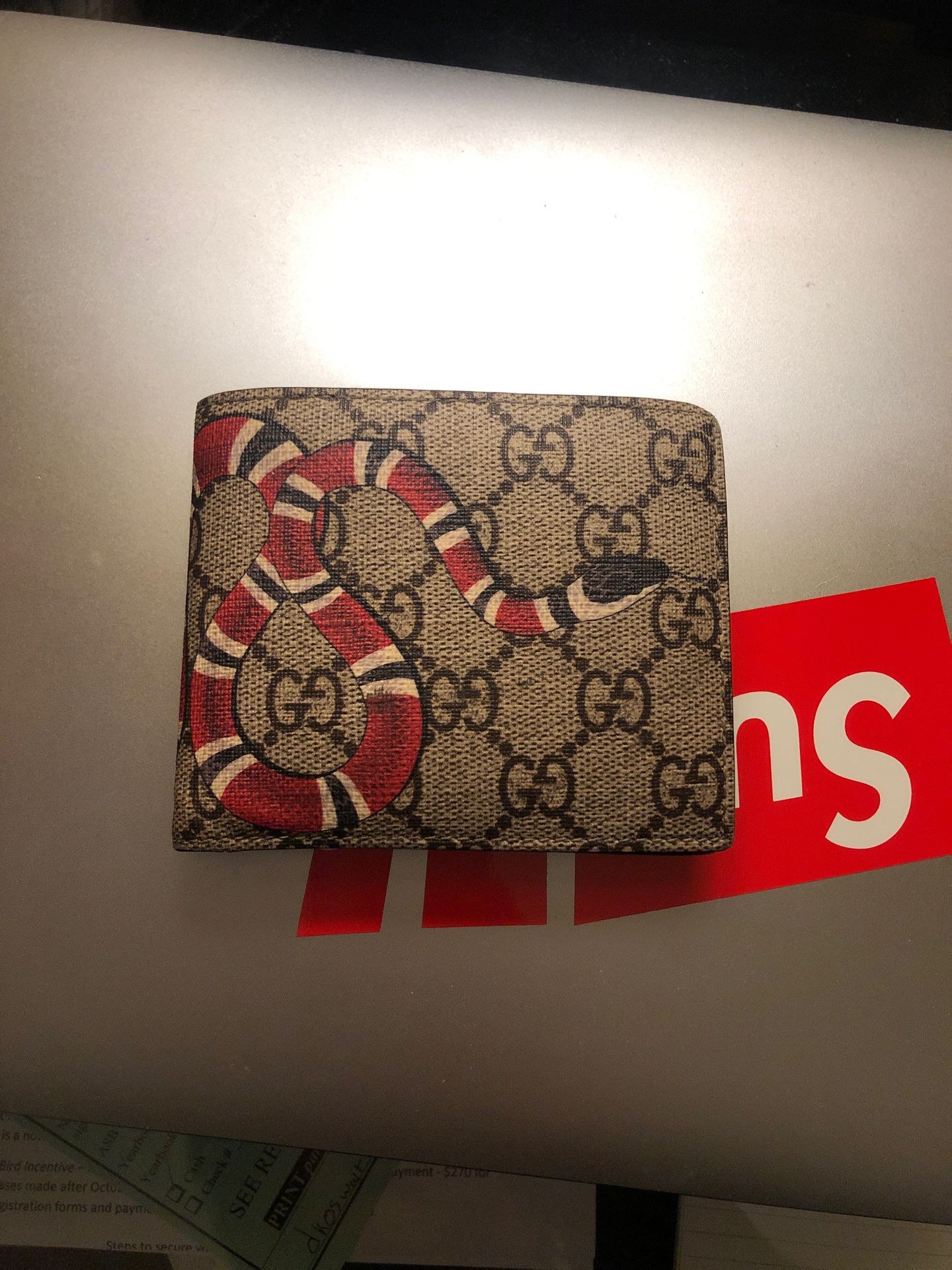 Gucci snake bi fold wallet