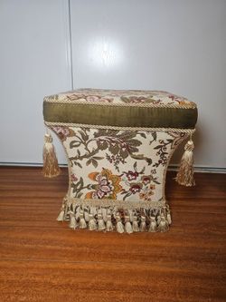 Floral Upholstered Ottoman with Tassel Trim