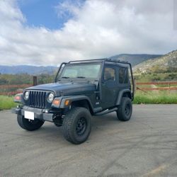 Jeep Wrangler TJ With Roof Rack Tires