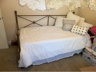 Brand new day bed with trundle, mattress, and bedding