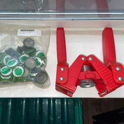 Bottle Capper And New Bag Of Bottle Caps 