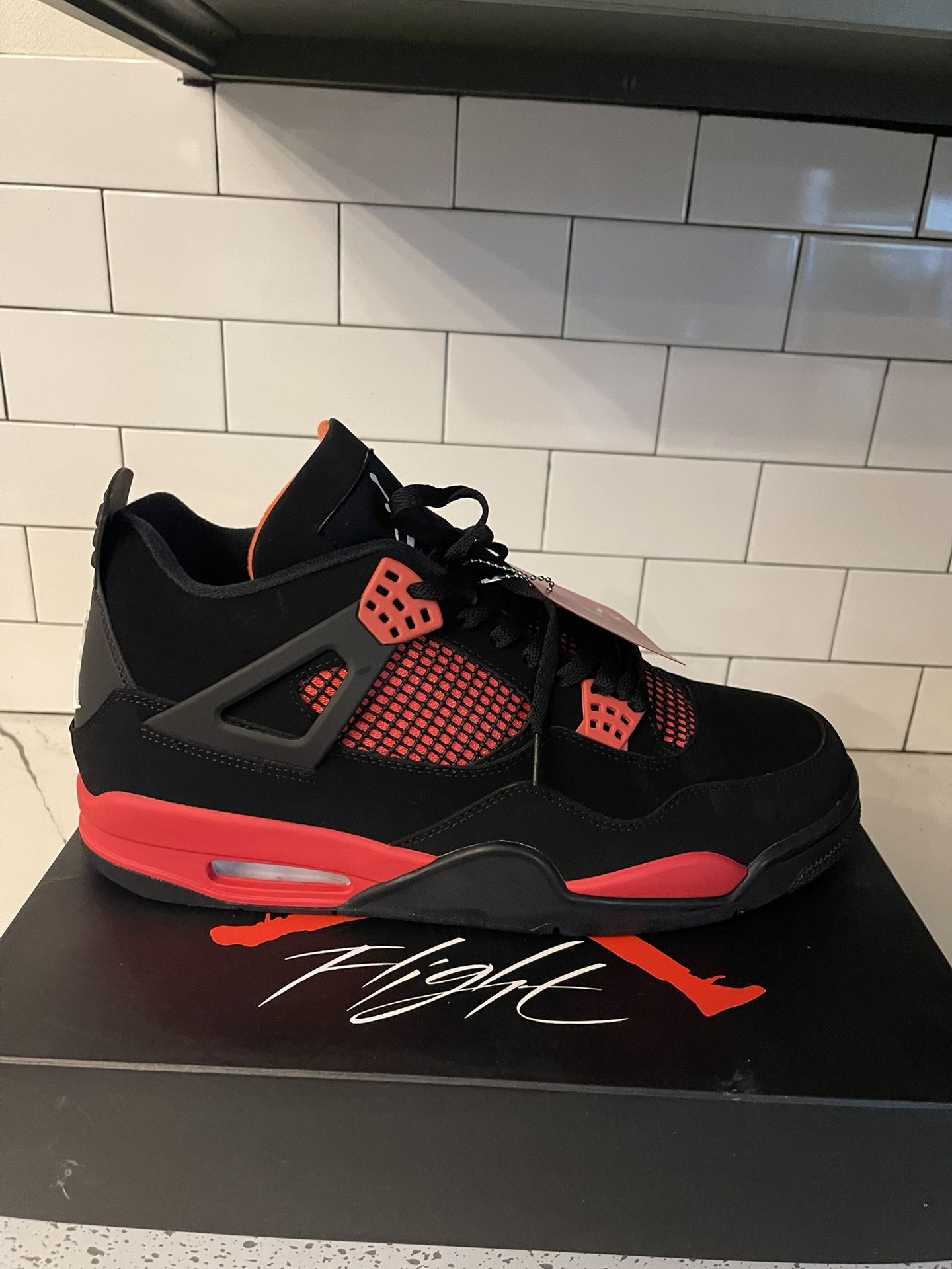 Men’s Jordan Retro 4 Red Thunder Size 14.