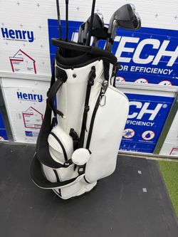 White Golf Stand Bag with Clubs like new!
